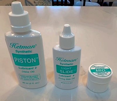 My personal collection of what I think are the best lubricants to use. Hetman Synthetic Valve oil #2, Hetman Synthetic Slide Oil #4, and Hetman Synthetic Slide Grease (Multipurpose Instrument Grease) MIG.  All sitting on my white kitchen counter.